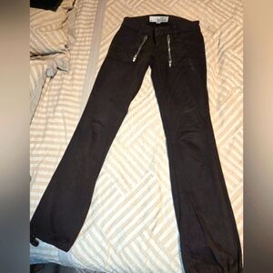 GuessCo rich chocolat shade stretchy mid rize Women's Jeans. Size27